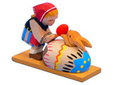 Mädchen mit Hase im Ei